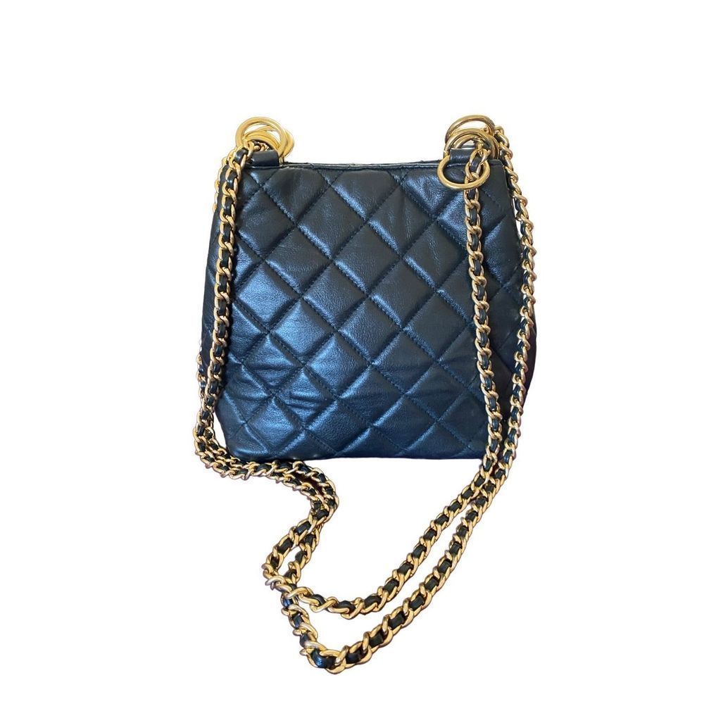 Vintage Lord and Taylor, black leather quilted bag with gold chain detail strap